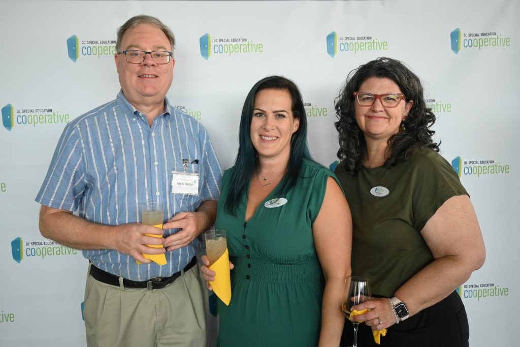 A volunteer from Compass Pro Bono and two Co-op staff members